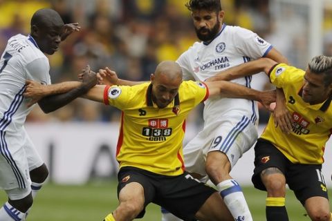 Watford's Nordin Amrabat, center challenges for the ball against Chelsea's Diego Costa, second right, during the English Premier League soccer match between Watford and Chelsea at Vicarage Road stadium in London, Saturday, Aug. 20, 2016.(AP Photo/Frank Augstein)