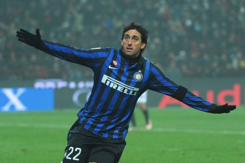 Inter Milan's Argentine forward Milito celebrates after scoring during the Italian Serie A football match AC Milan against Inter on January 15, 2012 in San Siro stadium in Milan. AFP PHOTO / OLIVIER MORIN (Photo credit should read OLIVIER MORIN/AFP/Getty Images)