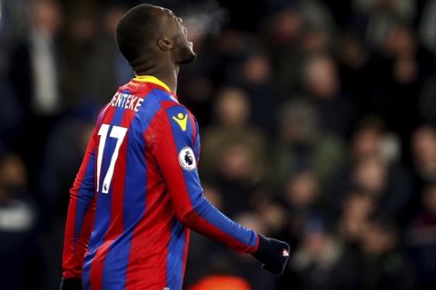 Crystal Palace's Christian Benteke rues his penalty miss during their English Premier League soccer match against AFC Bournemouth at Selhurst Park, London, Saturday, Dec. 9, 2017. (Scott Heavey/PA via AP)