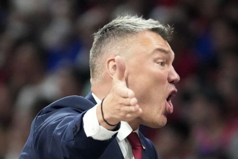 Barcelona's head coach Sarunas Jasikevicius gestures during a Final Four Euroleague semifinal basketball match between Barcelona and Real Madrid, in Belgrade, Serbia, Thursday, May 19, 2022. (AP Photo/Darko Vojinovic)