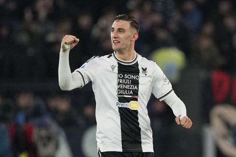 Udinese's Lorenzo Lucca celebrates after scoring his side's first goal during a Serie A soccer match between Lazio and Udinese, at Rome's Olympic Stadium, Monday, March 11, 2024. (AP Photo/Andrew Medichini)