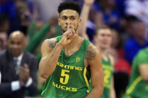 Oregon guard Tyler Dorsey gestures during the second half of the team's Midwest Regional final against Kansas in the NCAA men's college basketball tournament, Saturday, March 25, 2017, in Kansas City, Mo. (AP Photo/Orlin Wagner)