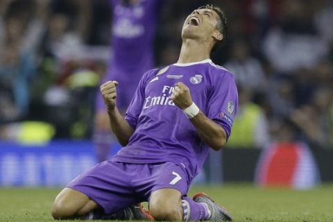 Real Madrid's Cristiano Ronaldo celebrates at the end of the Champions League final soccer match between Juventus and Real Madrid at the Millennium Stadium in Cardiff, Wales, Saturday June 3, 2017. Real Madrid won 4-1. (AP Photo/Tim Ireland)