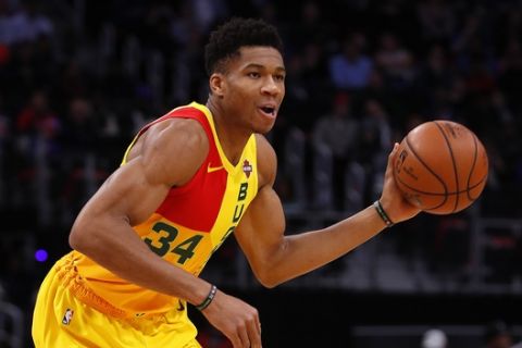Milwaukee Bucks forward Giannis Antetokounmpo plays against the Detroit Pistons in the first half of an NBA basketball game in Detroit, Monday, Dec. 17, 2018. (AP Photo/Paul Sancya)