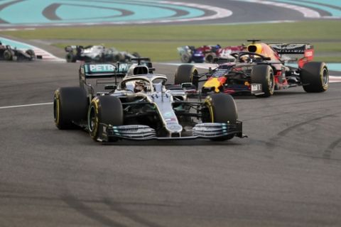Mercedes driver Lewis Hamilton of Britain leads during the Emirates Formula One Grand Prix, at the Yas Marina racetrack in Abu Dhabi, United Arab Emirates, Sunday, Dec.1, 2019. (AP Photo/Kamran Jebreili)
