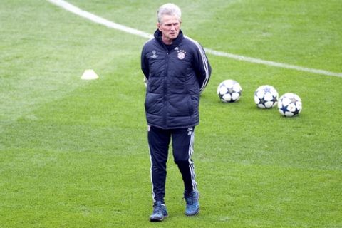 FILE - In this April 9, 2013 file photo Bayern Munich coach Jupp Heynckes leads a training session ahead of Wednesday's Champions League, round of eight, return-leg soccer match against Juventus, in Turin, Italy. (AP Photo/Massimo Pinca, file)