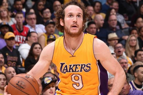LOS ANGELES, CA - MARCH 1: Marcelo Huertas #9 of the Los Angeles Lakers handles the ball against the Brooklyn Nets on March 1, 2016 at STAPLES Center in Los Angeles, California. NOTE TO USER: User expressly acknowledges and agrees that, by downloading and/or using this Photograph, user is consenting to the terms and conditions of the Getty Images License Agreement. Mandatory Copyright Notice: Copyright 2016 NBAE (Photo by Andrew D. Bernstein/NBAE via Getty Images)