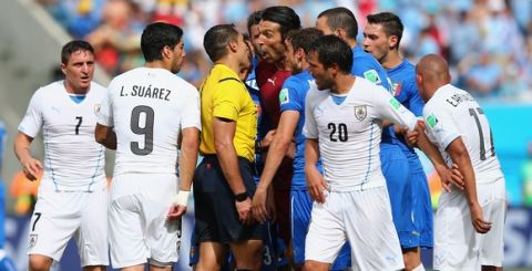 NATAL, BRAZIL - JUNE 24:  Gianluigi Buffon of Italy  appeals to referee Marco Rodriguez after Claudio Marchisio is sent off during the 2014 FIFA World Cup Brazil Group D match between Italy and Uruguay at Estadio das Dunas on June 24, 2014 in Natal, Brazil.  (Photo by Jamie Squire/Getty Images)