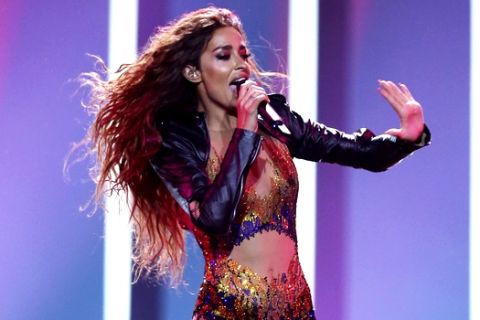 Eleni Foureira from Cyprus performs the song 'Fuego' in Lisbon, Portugal, Friday, May 11, 2018 during a dress rehearsal for the Eurovision Song Contest. The Eurovision Song Contest grand final takes place in Lisbon on Saturday May 12, 2018. (AP Photo/Armando Franca)