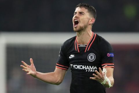 Chelsea's Jorginho celebrates at the end of the group H Champions League soccer match between Ajax and Chelsea at the Johan Cruyff ArenA in Amsterdam, Netherlands, Wednesday, Oct. 23, 2019. Chelsea won 1:0. (AP Photo/Peter Dejong)