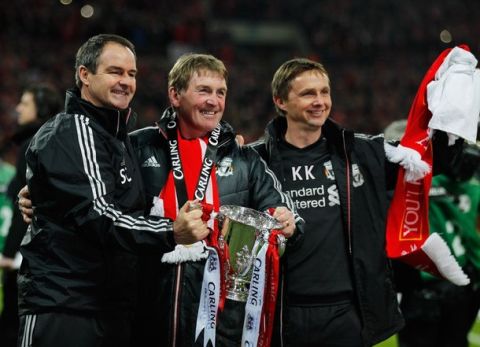 LONDON, ENGLAND - FEBRUARY 26:  Kenny Dalglish manager of Liverpool celebrates with Steve Clarke and Kevin Keen after victory in the Carling Cup Final match between Liverpool and Cardiff City at Wembley Stadium on February 26, 2012 in London, England. Liverpool won 3-2 on penalties.  (Photo by Paul Gilham/Getty Images)