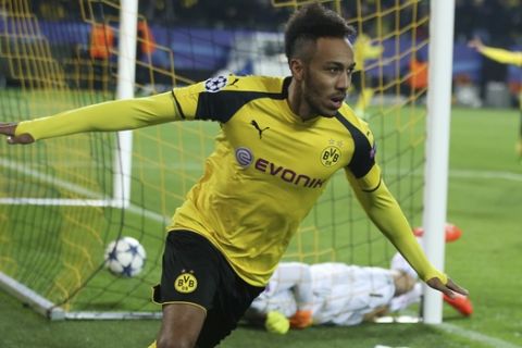 Dortmund's Pierre-Emerick Aubameyang celebrates after scoring the opening goal during the Champions League round of 16, second leg, soccer match between Borussia Dortmund and Benfica in Dortmund, Germany, Wednesday, March 8, 2017. (AP Photo/Michael Probst)