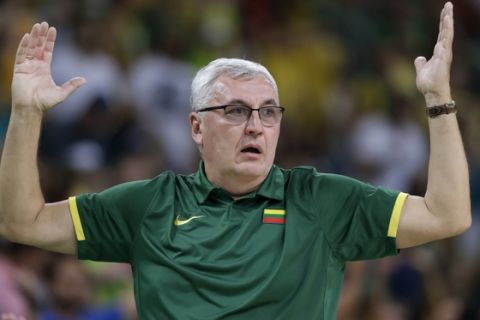 Lithuania head coach Jonas Kazlauskas reacts to a call during a basketball game against Brazil at the 2016 Summer Olympics in Rio de Janeiro, Brazil, Sunday, Aug. 7, 2016. (AP Photo/Charlie Neibergall)