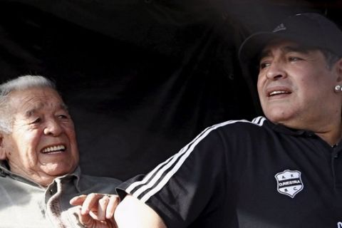 Former Argentina captain and coach Diego Maradona and his father Diego Maradona Senior, also known as Don Diego (L), attend the Primera D championship soccer match between Deportivo Riestra and San Miguel in Buenos Aires in this August 19, 2013 file photo. Don Diego died on June 25, 2015 at the age of 87 after a battle against heart and respiratory problems, local media reported. REUTERS/Marcos Brindicci/Files 
Picture Supplied by Action Images