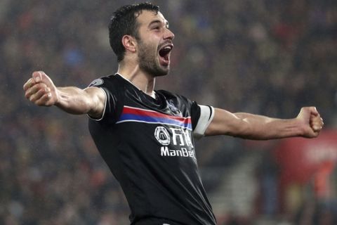 Crystal Palace's Luka Milivojevic celebrates scoring his side's second goal of the game against Southampton during their English Premier League soccer match at St Mary's Stadium in Southampton, Tuesday Jan. 2, 2018. (Andrew Matthews/PA via AP)