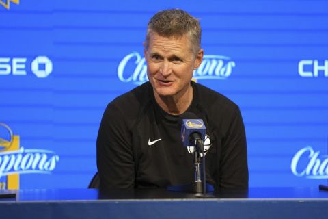 Golden State Warriors head coach Steve Kerr talks to media members before an NBA basketball game against the New Orleans Pelicans Tuesday, March 28, 2023, in San Francisco. (AP Photo/Darren Yamashita)