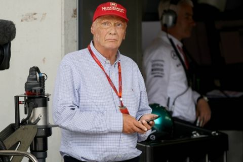 Honorary president of Mercedes Niki Lauda looks on  during the qualifying session prior to the Formula One Grand Prix, at the Red Bull Ring in Spielberg, southern Austria, Saturday, July 2, 2016. (AP Photo/Ronald Zak,Pool)