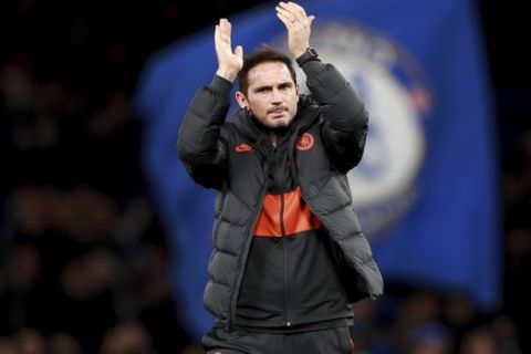 Chelsea's head coach Frank Lampard applauds to supporters at the end of the Champions League, group H, soccer match between Chelsea and Ajax, at Stamford Bridge in London, Tuesday, Nov. 5, 2019. (AP Photo/Ian Walton)