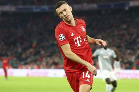 Bayern's Ivan Perisic reacts after scoring his side's second goal during the Champions League group B soccer match between Bayern Munich and Olympiakos in Munich, Germany, Wednesday, Nov. 6, 2019. (AP Photo/Matthias Schrader)