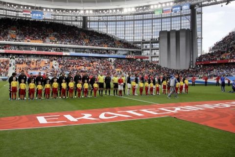 Teams line up ahead the group A match between Egypt and Uruguay at the 2018 soccer World Cup in the Yekaterinburg Arena in Yekaterinburg, Russia, Friday, June 15, 2018. (AP Photo/Mark Baker)