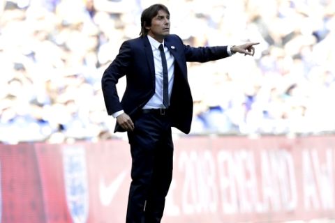 Chelsea head coach Antonio Conte gestures during the English FA Cup final soccer match between Chelsea and Manchester United at Wembley stadium in London, Saturday, May 19, 2018. (AP Photo/Tim Ireland)