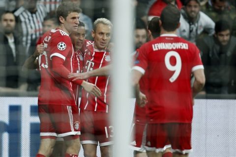 Bayern's players celebrate the opening goal of their team during the Champions League, round of 16, second leg, soccer match between Besiktas and Bayern Munich at Vodafone Arena stadium in Istanbul, Wednesday, March 14, 2018. (AP Photo/Lefteris Pitarakis)