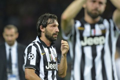 Juventus' midfielder Andrea Pirlo reacts at the end of the UEFA Champions League Final football match between Juventus and FC Barcelona at the Olympic Stadium in Berlin on June 6, 2015.  FC Barcelona won the match 1-3.   AFP PHOTO / OLIVER LANG        (Photo credit should read OLIVER LANG/AFP/Getty Images)