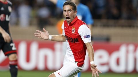 Monaco's Portuguese midfielder Joao Moutinho celebrates a goal during the Champions League football match Monaco (ASM) vs Bayer Leverkusen on September 16, 2014 at the "Louis II Stadium" in Monaco. AFP PHOTO / VALERY HACHE        (Photo credit should read VALERY HACHE/AFP/Getty Images)
