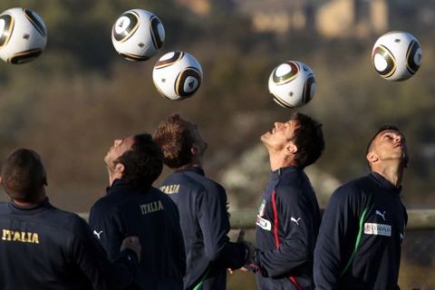 FILE - In this June 9, 2010 file photo, from left, Italy's Angelo Palombo, Giampaolo Pazzini, Alberto Gilardino, Christian Maggio, Fabio Quagliarella and Gennaro Gattuso head balls during a training session at the 2010 World Cup at the Southdowns College, in Irene, near Pretoria, South Africa. Four years ago, the Azzurri went to the World Cup warm-up tournament in South Africa as world champions and went home after the first round. A year later, at the 2010 World Cup, Italy again was eliminated after the group stage. Expect Italy to treat the Confederations Cup more seriously this time. (AP Photo/Alessandra Tarantino, File)