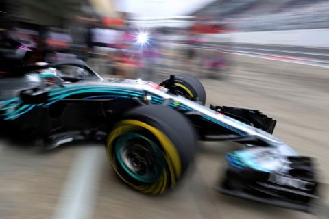 Mercedes driver Lewis Hamilton of Britain pulls out of his garage during the first practice session at the Suzuka Circuit ahead of the Japanese Formula One Grand Prix in Suzuka, central Japan Friday, Oct. 5, 2018. (AP Photo/Ng Han Guan)