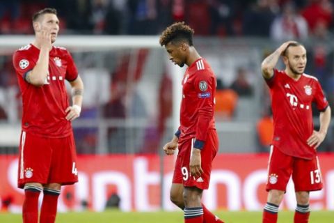 Bayern Munich's players are dejected at the end of the Champions League round of 16 second leg soccer match between Bayern Munich and Liverpool in Munich, Germany, Wednesday, March 13, 2019. (AP Photo/Matthias Schrader)