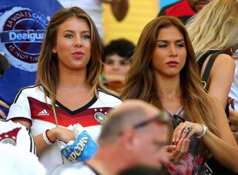 RIO DE JANEIRO, BRAZIL - JULY 04:  Montana Yorke (L), girlfriend of Andre Schuerrle of Germany, and Ann-Kathrin Brommel, girlfriend of Mario Gotze of Germany, looks on during the 2014 FIFA World Cup Brazil Quarter Final match between France and Germany at Maracana on July 4, 2014 in Rio de Janeiro, Brazil.  (Photo by Martin Rose/Getty Images)