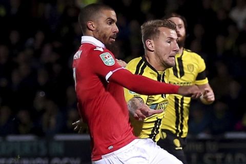 Nottingham Forest's Lewis Grabban scores his side's first goal of the game  during the fourth round English Football League Cup soccer match between Burton Albion and Nottingham Forest,  at the Pirelli Stadium, in Burton, England, Tuesday, Oct. 30, 2018. (Nigel French/PA via AP)