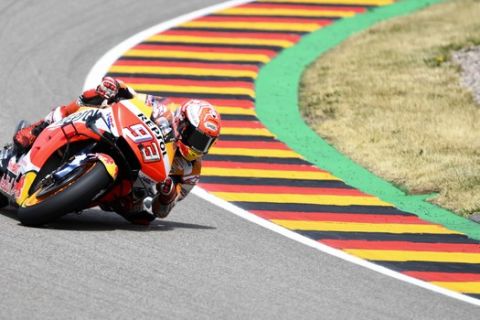 Spain's Marc Marquez steers his motorcycle during the MotoGP race at German Motorcycle Grand Prix at the Sachsenring circuit in in Hohenstein-Ernstthal, Sunday, July 7, 2019. (AP Photo/Jens Meyer)