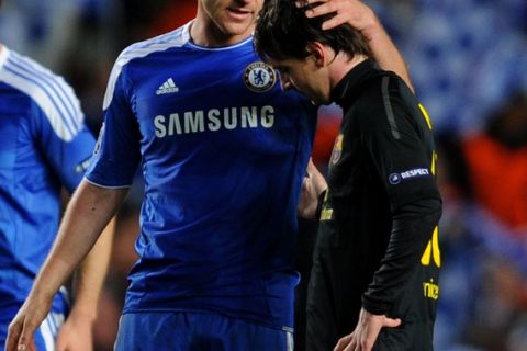 LONDON, ENGLAND - APRIL 18:  Lionel Messi of Barcelona is consoled by John Terry of Chelsea after the final whistle during the UEFA Champions League Semi Final first leg match between Chelsea and Barcelona at Stamford Bridge on April 18, 2012 in London, England.  (Photo by Michael Regan/Getty Images)