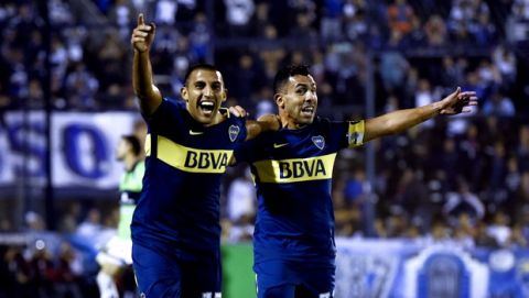 Boca Juniors' Ramon Abila, of Argentina, left, celebrates his goal against Gimnasia y Esgrima, with the teammate Carlos Tevez during a local tournament soccer match in Buenos Aires, Argentina, Wednesday, May 9, 2018. (AP Photo/Gustavo Garello)