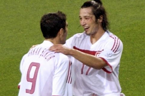 Turkey's Ilhan Mansiz, facing camera, celebrates with teammate Hakan Sukur after scoring during the 2002 World Cup third place playoff soccer match between South Korea and Turkey, at the Daegu World Cup stadium, in Daegu, South Korea, Saturday, June 29, 2002. (AP Photo/Rob Taggart)