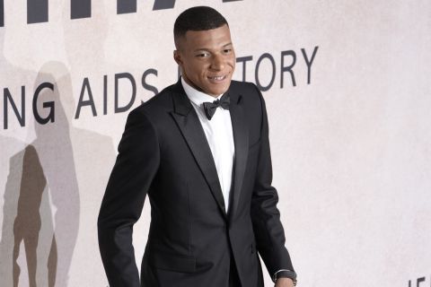 Kylian Mbappe poses for photographers upon arrival at the amfAR Cinema Against AIDS benefit at the Hotel du Cap-Eden-Roc, during the 75th Cannes international film festival, Cap d'Antibes, southern France, Thursday, May 26, 2022. (Photo by Joel C Ryan/Invision/AP)