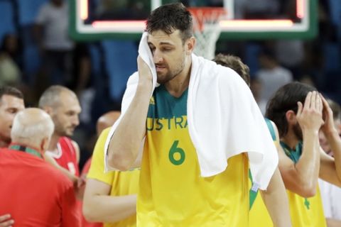 Australia's Andrew Bogut (6) walks off the court after a semifinal round basketball game against Serbia at the 2016 Summer Olympics in Rio de Janeiro, Brazil, Friday, Aug. 19, 2016. (AP Photo/Charlie Neibergall)