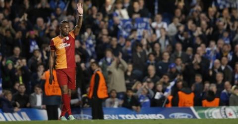 Galatasaray's Ivorian forward Didier Drogba acknowledges the crowd at the end of the UEFA Champions League round of 16 second leg football match between Chelsea and Galatasaray at Stamford Bridge in London, on March 18, 2014. AFP PHOTO / ADRIAN DENNIS        (Photo credit should read ADRIAN DENNIS/AFP/Getty Images)