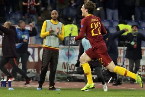 Roma midfielder Nicolo' Zaniolo celebrates after scoring the opening goal of his team during a Champions League round of 16 first leg soccer match between Roma and Porto, at Rome's Olympic Stadium, Tuesday, Feb. 12, 2019. (AP Photo/Andrew Medichini)