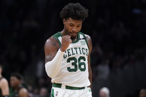 Boston Celtics guard Marcus Smart (36) during an NBA basketball game, Wednesday, March 30, 2022, in Boston. (AP Photo/Charles Krupa)