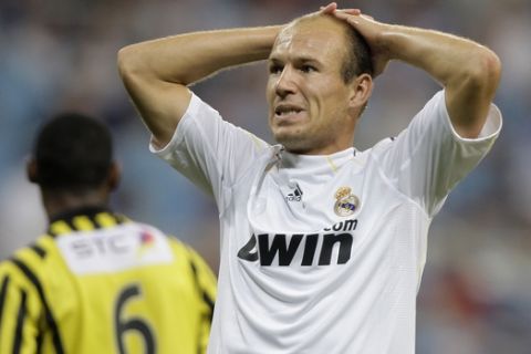 Real Madrid's Arjen Robben of the Netherlands reacts during the Peace Cup Andalucia 2009 soccer tournament against Al-Ittihad at the Santiago Bernabeu stadium in Madrid, in the early hours of July 27, 2009. The match ended 1-1. (AP Photo/Paul White)