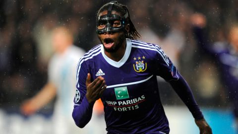 Anderlecht's Dieumerci Mbokani celebrates after scoring a goal during an UEFA Champions League group C football match against Zenit St Petersburg at the Constant Vanden Stock Stadium on November 6, 2012 in Brussels. AFP PHOTO/JOHN THYS        (Photo credit should read JOHN THYS/AFP/Getty Images)
