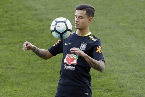 Brazil's Philippe Coutinho practices during a training session in Sao Paulo, Brazil, Sunday, March 26, 2017. Brazil will face Paraguay in a 2018 World Cup qualifying soccer match on March 28. (AP Photo/Andre Penner)