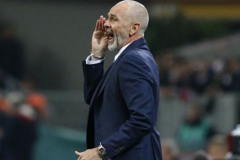 Inter Milan coach Stefano Pioli gives instructions during the Serie A soccer match between Inter Milan and Napoli at the San Siro stadium in Milan, Italy, Sunday, April 30, 2017. (AP Photo/Antonio Calanni)