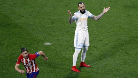 Marseille's Konstantinos Mitroglou reacts after missing a chance to score during the Europa League Final soccer match between Marseille and Atletico Madrid at the Stade de Lyon outside Lyon, France, Wednesday, May 16, 2018. (AP Photo/Christophe Ena)