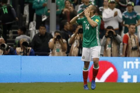 Mexico's Javier Hernandez celebrates after scoring his side's first goal during a 2018 Russia World Cup qualifying soccer match between Mexico and Costa Rica at Azteca stadium in Mexico City, Friday, March 24, 2017. (AP Photo/Eduardo Verdugo)