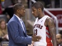 Toronto Raptors head coach Dwane Casey, left, talk with Raptors guard Dwight Buycks, right, while playing against the Minnesota Timberwolves during second half NBA pre-season basketball action in Toronto on Wednesday, Oct. 9, 2013. THE CANADIAN PRESS/Nathan Denette