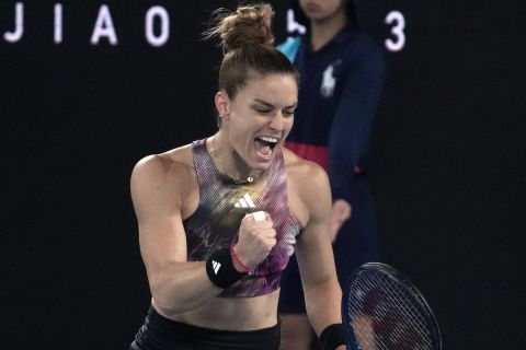 Maria Sakkari of Greece reacts after winning a point against Diana Shnaider of Russia during their second round match at the Australian Open tennis championship in Melbourne, Australia, Wednesday, Jan. 18, 2023. (AP Photo/Ng Han Guan)